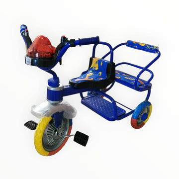 Blue children's tricycle with colorful wheels on a white background